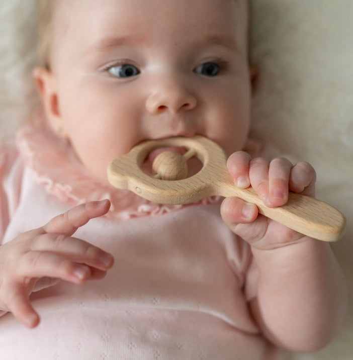 Beech wood bear rattle and silicone teether ring set blush pink