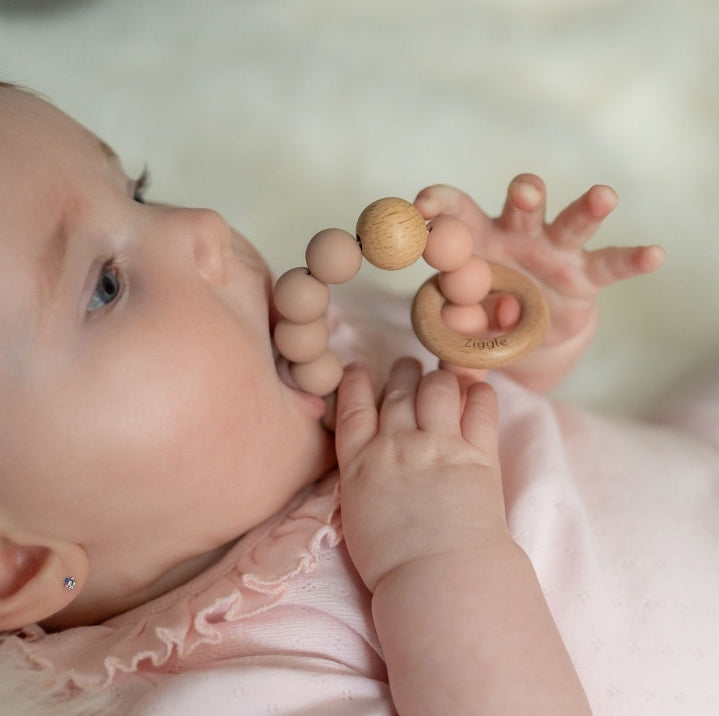 Beech wood bear rattle and silicone teether ring set blush pink